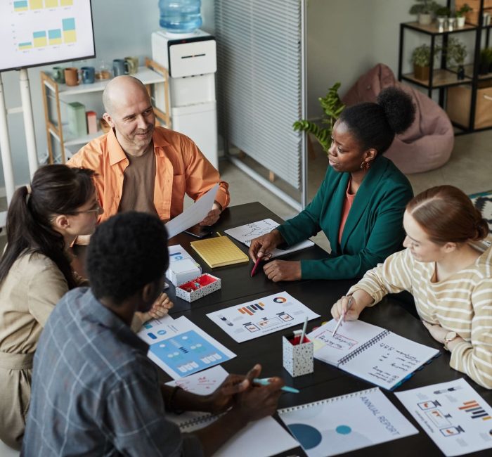 diverse-business-team-meeting-at-table-2023-11-27-04-49-47-utc